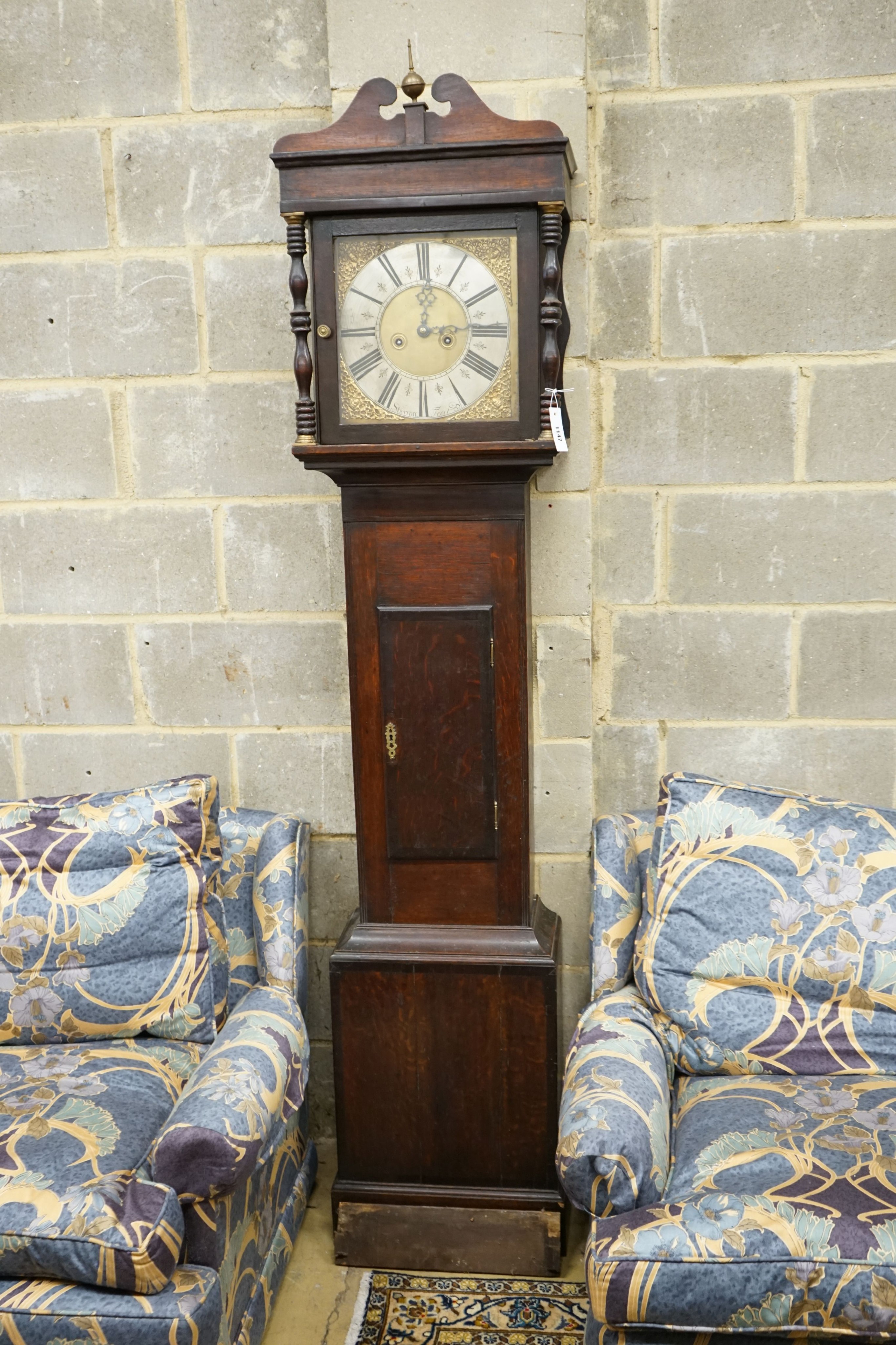 An 18th century oak eight day longcase clock, marked Sherratt, height 208cm